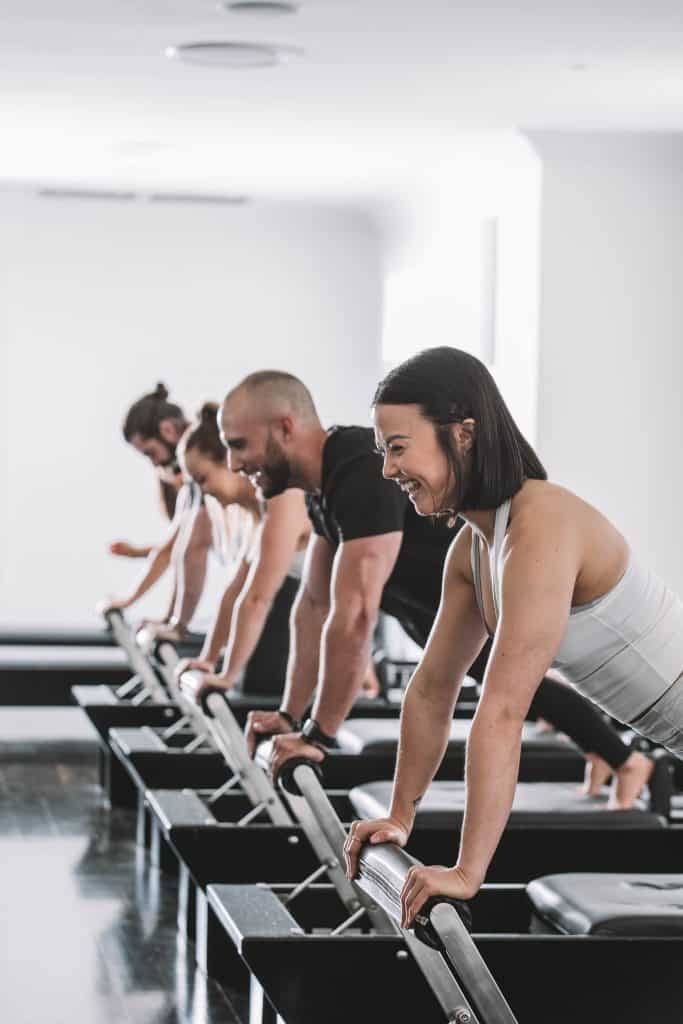 Image of four people at Studio Pilates International Class