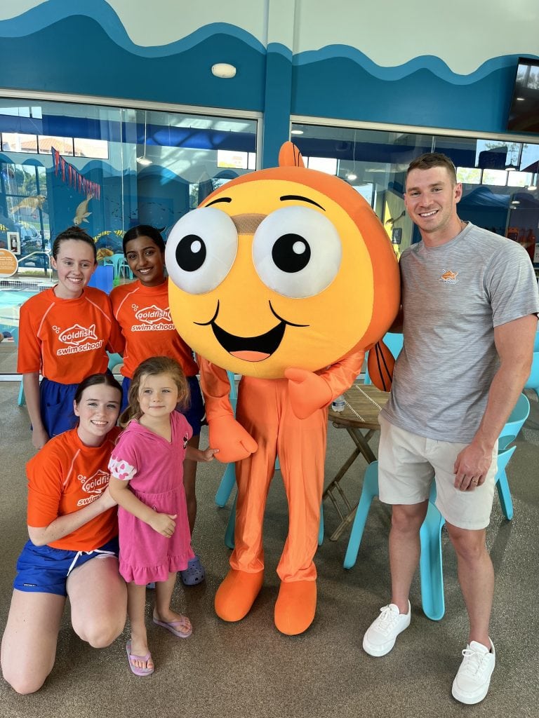 Image of Ryan Murphy, team, student and Bubbles for Goldfish Swim School