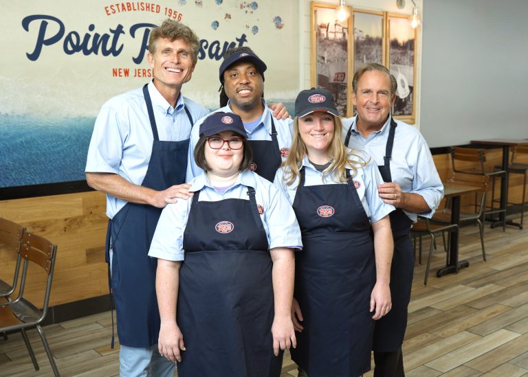 Image showing participants of the story. Best Buddies and Jersey Mikes Franchise Heart