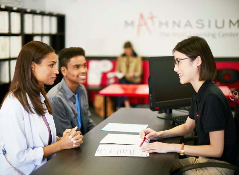 Photo of people inside a Mathnasium learning center.