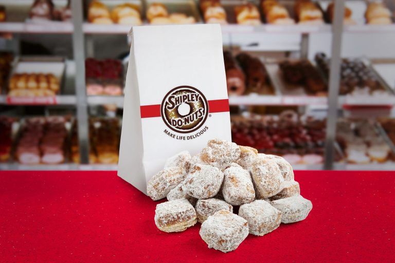 Image of Shuley Do-Nuts Yays Beignets on counter at donut shop