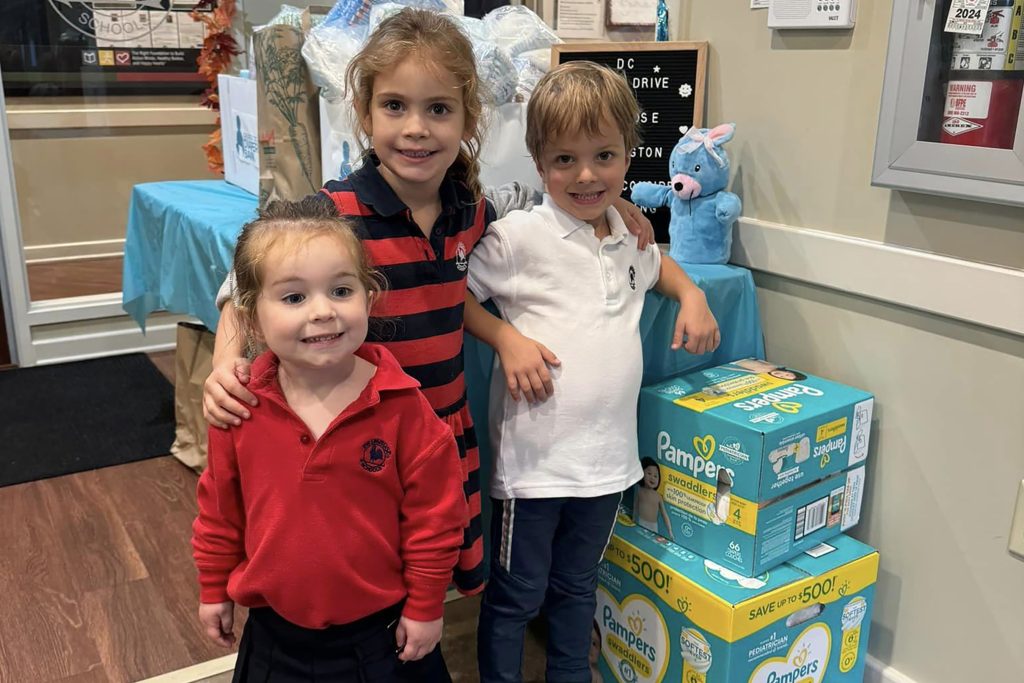 Students at Primrose School of Arlington in Arlington, Virginia sort diapers to give to underserved children in their community. 