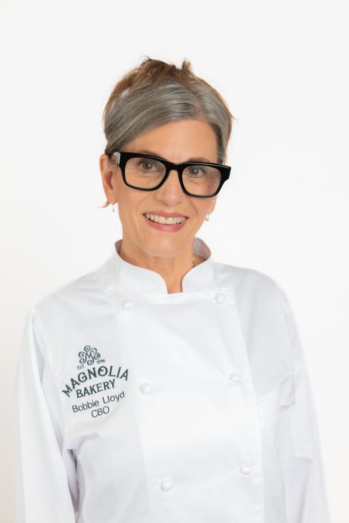 Image of Bobbie Lloyd CEO of Magnolia Bakery in Chef gear