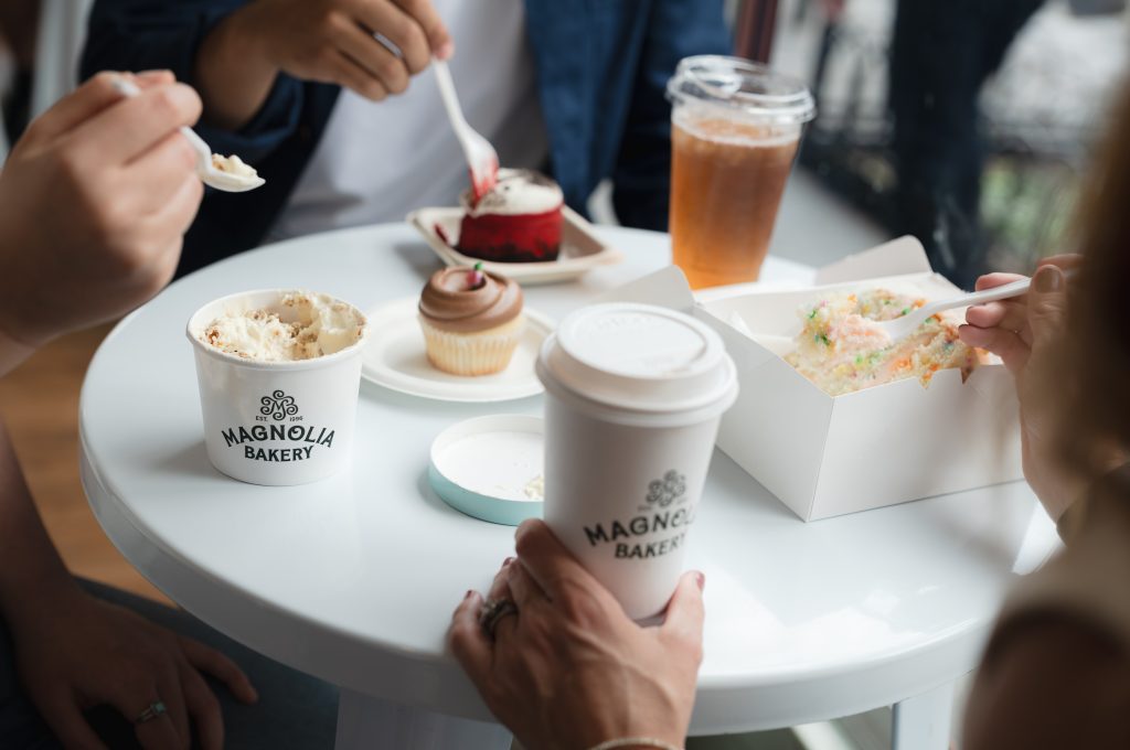 Magnolia Bakery Table with Menu Items featuring coffee, ice cream, cupcakes and cake